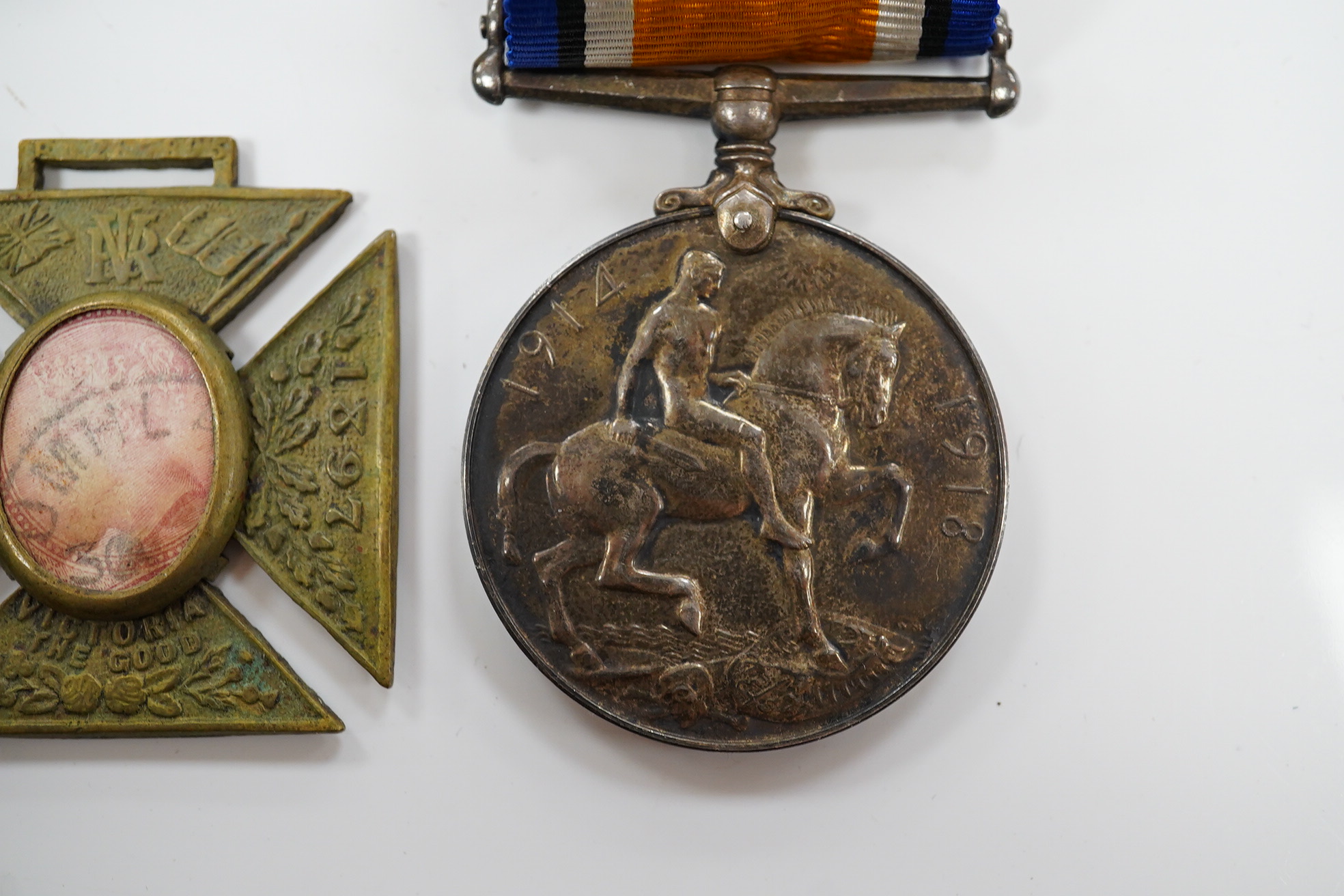 A First World War middle group awarded to A. SJT. E.E. Bogardis 24-CAN. INF. comprising of a medal pair and an 1897 Diamond Jubilee medal for Queen Victoria. Condition - poor to fair